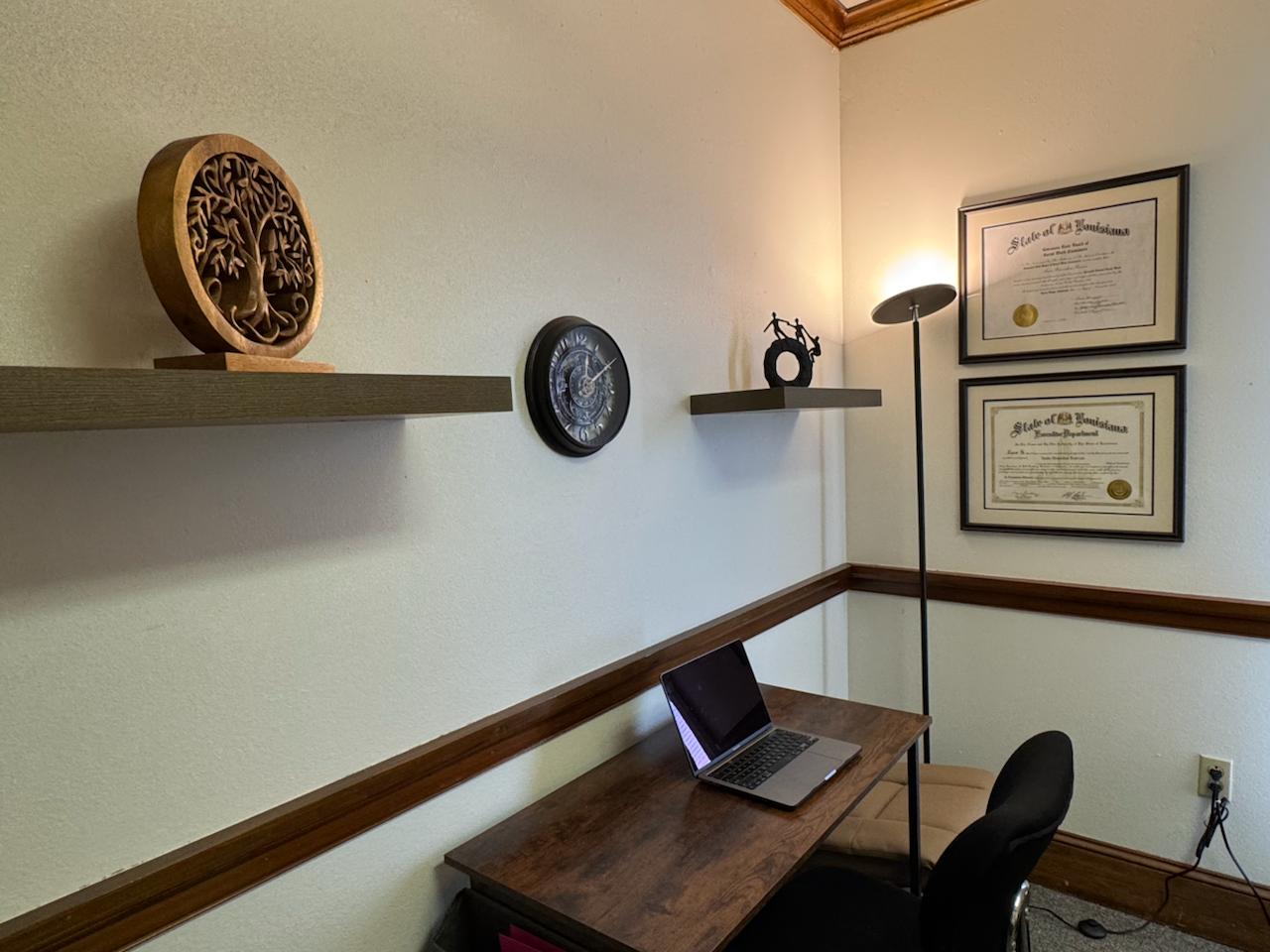 Brandon Reeves, LCSW therapy office desk with professional credentials displayed