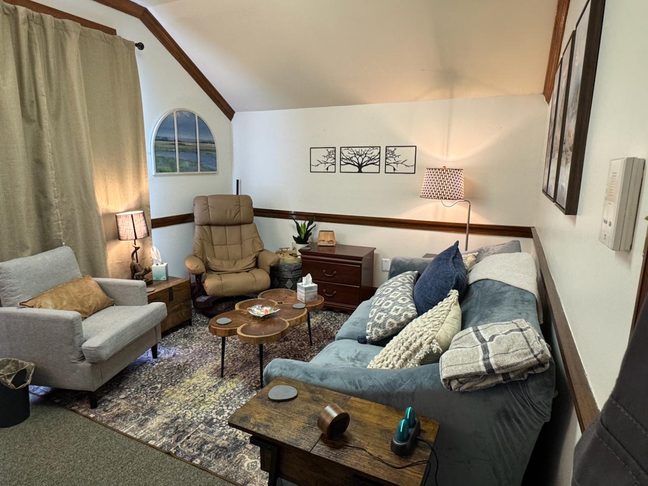 Private therapy room with natural light and comfortable seating at Brandon Reeves, LCSW in Baton Rouge