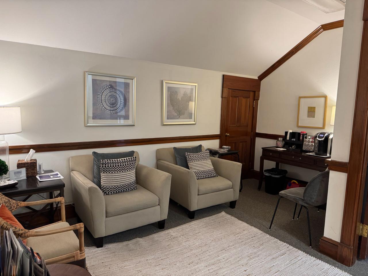 Welcoming waiting room with seating and coffee station at Brandon Reeves, LCSW therapy office